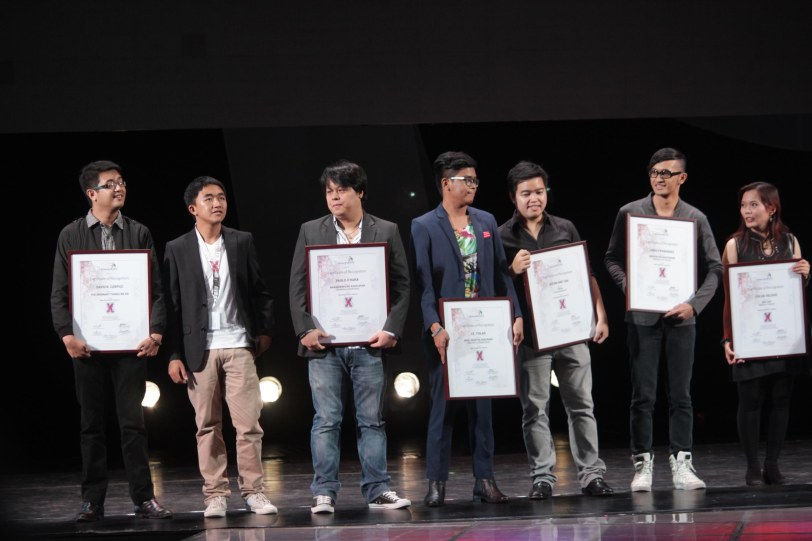 Short filmmakers from right: Chloe Anne Veloso (INA-TAY), Joris Fernandez (INDAYOG NG NAYATAMAK), Kevin Ang (LOLA), Janne Eric ‘JE’ Tiglao (MGA LIGAW NA PARU PARO), Paolo O’Hara (NAKAKABINGING KADILIMAN), Ralph Aldrin L. Quijano (TIYA BENING), David R. Corpuz (THE ORDINARY THINGS THAT WE DO) and—NOT IN PHOTO is Fedwilyn Villarba Sadolboro (PADULONG SA PINUY-ANAN). The Cinemalaya X Awards was held last August 10, 2014 at the CCP. Watch out for Cinemalaya films’ commercial release in the coming months. Photo by Jude Bautista
