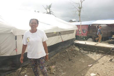 Nearly a year later, people still live in tents in Tacloban. Photo by Jude Bautista