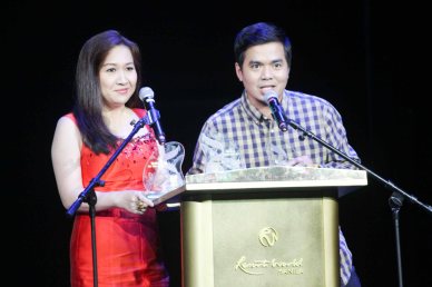 Universal Records General Mgr Kathleen Dy Go (left) with Gloc 9 who won Album of the year (LIHAM AT LIHIM), Song of the Year (MAGDA featuring Rico Blanco), Best Collaboration Performance (MAGDA featuring Rico Blanco) and Best Rap (MAGDA). The 27th Awit Awards was held at the Newport Performing Arts Theater, Resort’s World Manila last December 12, 2014. Photo by Jude Bautista