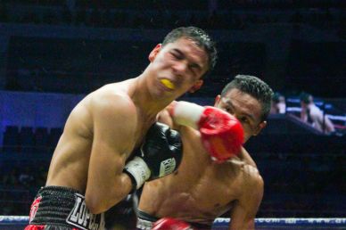 Donnie Nietes lands vicious overhand right and snaps Parra’s head back. PINOY PRIDE 30 D-Day was held at the SMART Araneta Coliseum last March 28, 2015. Photo by Jude Bautista