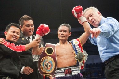 Donnie Nietes raises his hand in victory after 10th rd TKO victory over Gilberto Parra. He successfully defends his WBO/IBF World Jr Flyweight Belt for the 7th time. PINOY PRIDE 30 D-Day was held at the SMART Araneta Coliseum last March 28, 2015. Photo by Jude Bautista