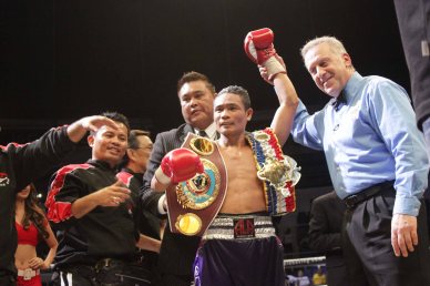 Donnie Nietes raises his hand in victory after 10th rd TKO victory over Gilberto Parra. He successfully defends his WBO/IBF World Jr Flyweight Belt for the 7th time. PINOY PRIDE 30 D-Day was held at the SMART Araneta Coliseum last March 28, 2015. Photo by Jude Bautista